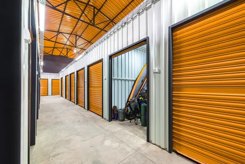 Orange storage units lined up with one of them open